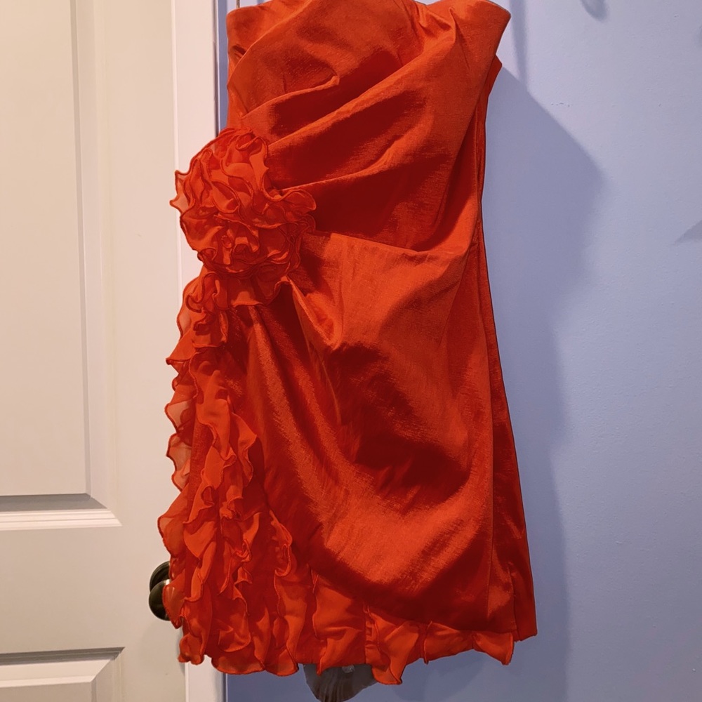 Strapless orange dress with flower detail